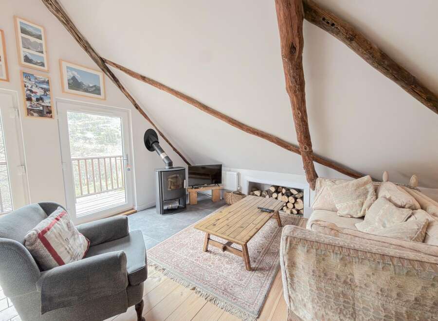 Discover the charm of this cozy living space, perfect for relaxing after a day of exploring.