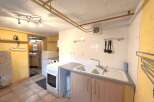 Discover this charming kitchen space, perfect for culinary enthusiasts.