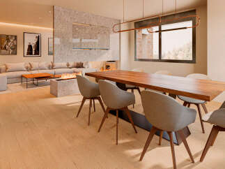 Experience luxury living in this stunning property featuring a modern dining area with a sleek wooden table and stylish chairs.