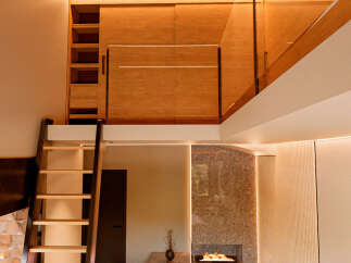 This stunning property boasts a modern design with a unique mezzanine level, perfect for creating a cozy living space or home office.