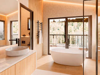 Step into luxury with this stunning bathroom featuring a modern design and high-end finishes.