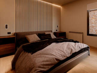 Step into a serene bedroom retreat, designed for ultimate comfort and style.