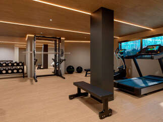 Step into a state-of-the-art home gym, designed for the ultimate fitness experience.