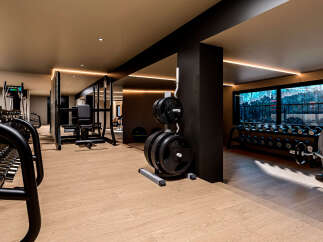Step into a state-of-the-art fitness center, designed for optimal performance and comfort.