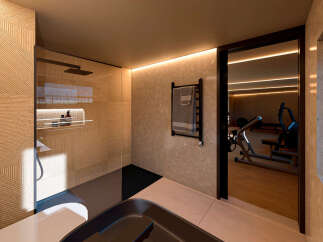 Step into luxury with this stunning bathroom, featuring a sleek glass shower and modern fixtures.