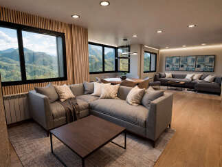 Experience luxury living in this stunning property featuring a spacious living room with a modern sectional sofa.