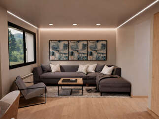 Discover modern living in this stylish property! This home features a spacious living area with a comfortable sectional sofa, perfect for relaxing or entertaining.