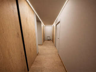 Step into a beautifully designed hallway, showcasing a seamless blend of modern aesthetics and functionality.