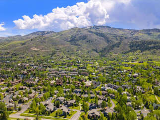 Nestled in a picturesque mountain setting, this property offers stunning views and a tranquil atmosphere.