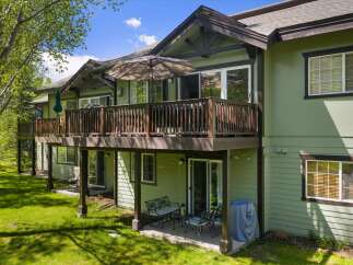 Enjoy the beauty of this stunning property featuring a spacious deck perfect for outdoor relaxation and entertaining.