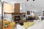 Experience cozy living in this inviting living room, featuring a stunning stacked stone fireplace as the centerpiece.