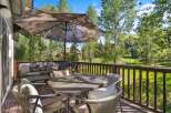 Enjoy outdoor living on this spacious deck, perfect for entertaining or relaxing.