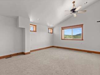 This stunning property boasts a bright and airy interior with a neutral color palette, perfect for any design style.