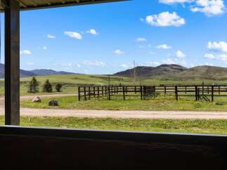 Enjoy breathtaking views of the countryside from this stunning property.