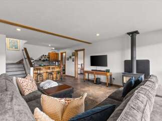 Step into this inviting living space, perfect for relaxation and entertaining.
