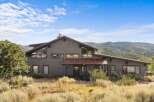 Experience rustic charm and breathtaking mountain views from this unique home.