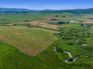 Discover the beauty of this expansive rural property, perfect for those seeking a tranquil escape.