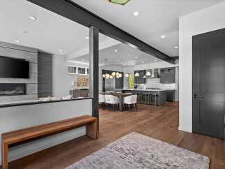 This stunning modern home boasts an open-concept design, perfect for entertaining.