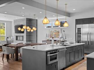 Experience luxury living in this stunning modern kitchen.