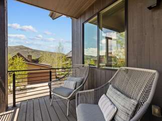 Enjoy breathtaking mountain views from this stunning outdoor space.