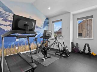 This home gym is the perfect space to achieve your fitness goals.