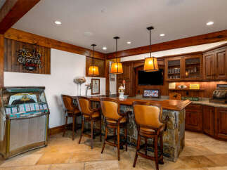 Step into luxury with this stunning home bar, perfect for entertaining.