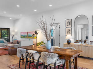 Step into this stunning home featuring a spacious dining area, perfect for hosting gatherings.