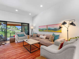 Step into this inviting living space, showcasing a blend of comfort and style.
