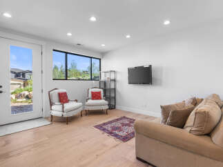 Step into this inviting living space, featuring a modern design with ample natural light.