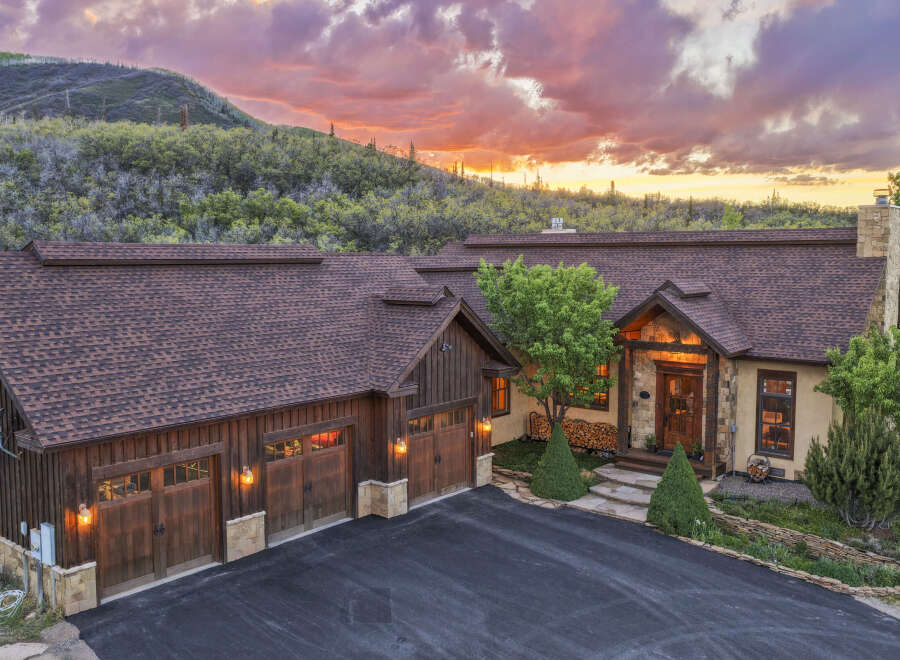 Experience luxury mountain living in this stunning custom-built home, nestled against a backdrop of breathtaking natural beauty.