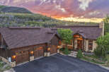 Experience luxury mountain living in this stunning custom-built home, nestled against a backdrop of breathtaking natural beauty.