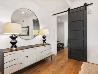 Step into modern elegance with this stunning entryway.