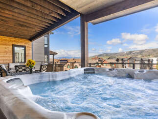 Enjoy the ultimate relaxation in this luxurious property featuring a private hot tub.