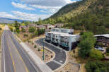 Discover modern living in this new construction townhome community nestled against a scenic mountainside.