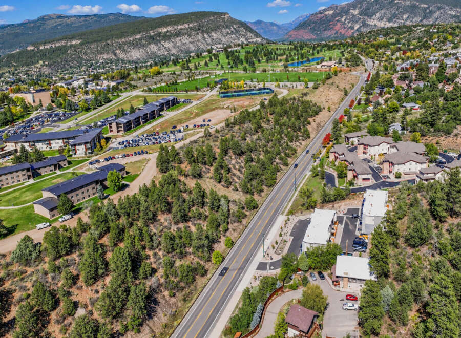 Discover this expansive property nestled amidst rolling hills and mature trees, offering a serene and picturesque setting.