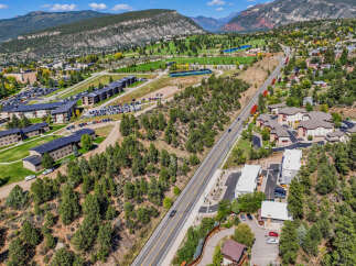 Discover this expansive property nestled amidst rolling hills and mature trees, offering a serene and picturesque setting.