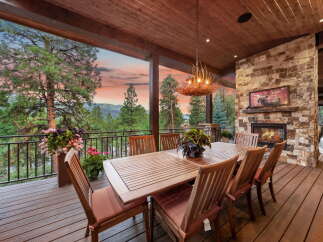 Experience luxury living with this stunning outdoor dining area.