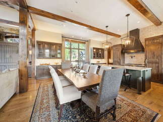 This stunning property boasts a seamless blend of rustic charm and modern elegance.