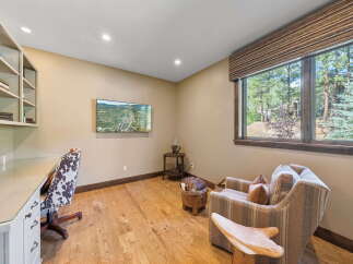 This stunning property boasts a beautifully designed home office, perfect for remote work or creative endeavors.