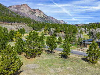 Discover a stunning property nestled amidst the breathtaking beauty of nature.