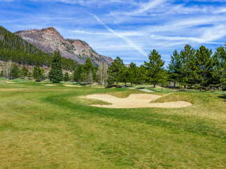 Enjoy breathtaking views and a serene atmosphere at this stunning golf course property.