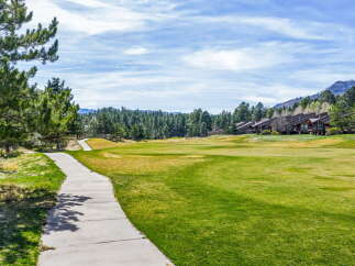 Discover the beauty of this stunning property, perfectly situated near a lush golf course.