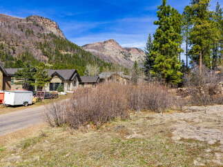 Nestled amidst the stunning mountain landscape, this property offers a serene retreat.
