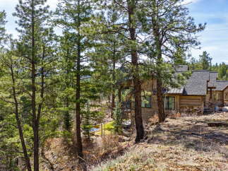 Nestled amidst the serene beauty of nature, this stunning property offers a perfect blend of luxury and tranquility.