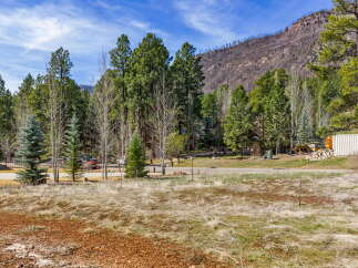 Discover the tranquility of this stunning property, nestled amidst lush greenery and breathtaking mountain views.