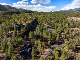 Discover your dream property nestled in a serene, wooded landscape.