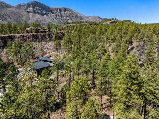 Discover your dream home nestled in a serene mountain setting.