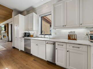 This stunning kitchen boasts modern design and functionality.