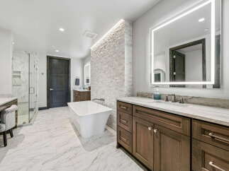Step into luxury with this stunning bathroom featuring a modern design and high-end finishes.