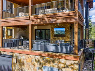 Experience luxury living with this stunning property featuring a spacious outdoor living area.